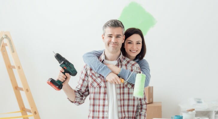 A young couple fixing up one of their rental properties