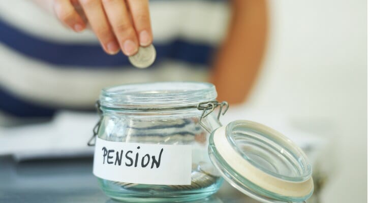 Putting a coin in a jar labeled "PENSION"