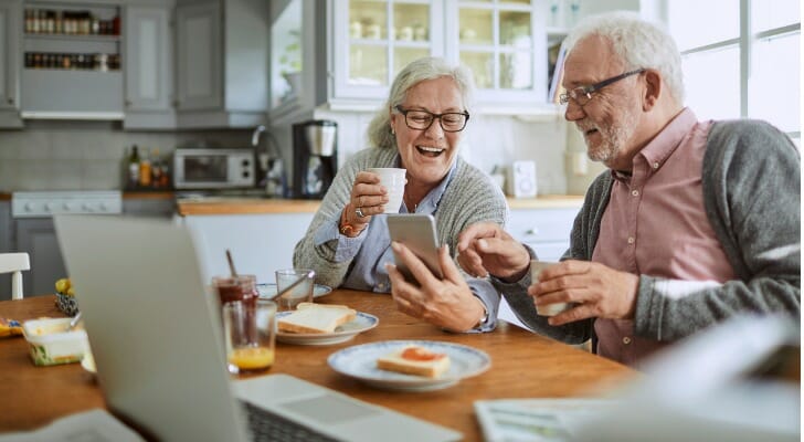 Older couple looking at their annuity's website