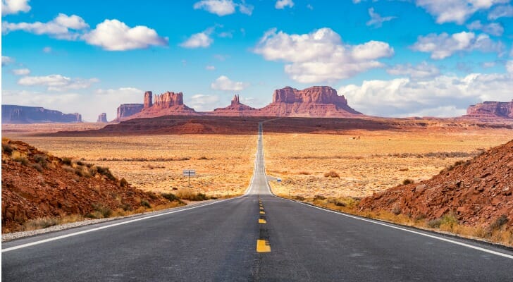 Road leading towards Monument Valley as seen from Forrest Gump Point, Utah