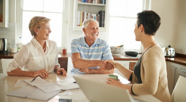 Retirement advisor talks with clients