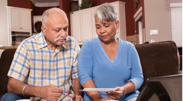 Senior couple preparing tax returns