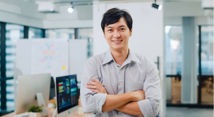 Young Asian male investor