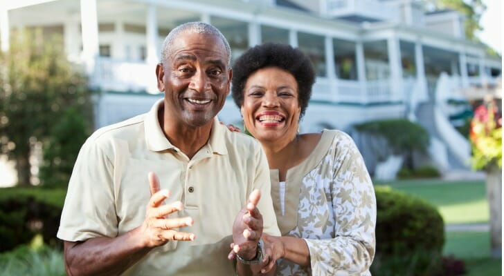 Mature African-American couple at a country club