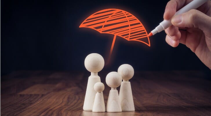 Drawing of an umbrella protecting a family