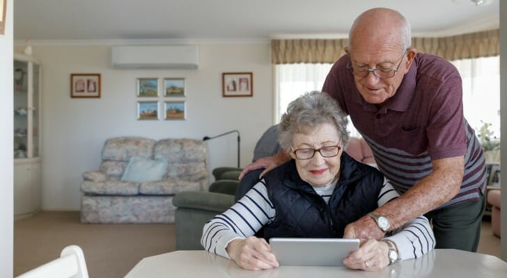 Senior couple reviews their income streams
