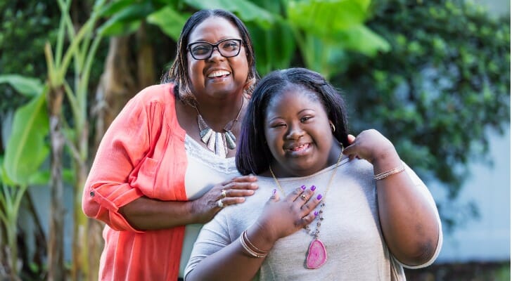 Mother and adult daughter with Downs Syndrome