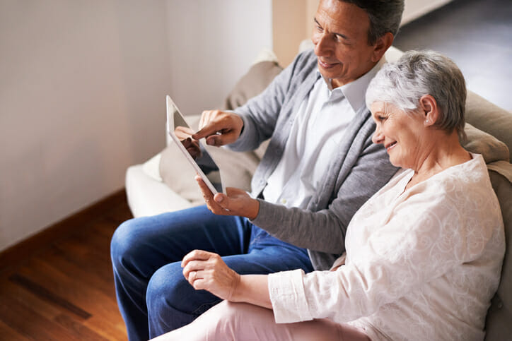 An older couple check their tax-deferred accounts.