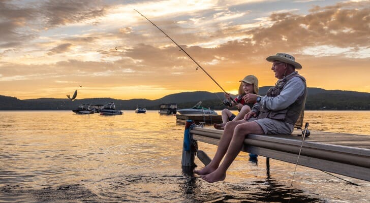 grandfather-and-grandson-fishing-at-sunset-in-summer-quebec-canada-SmartAsset