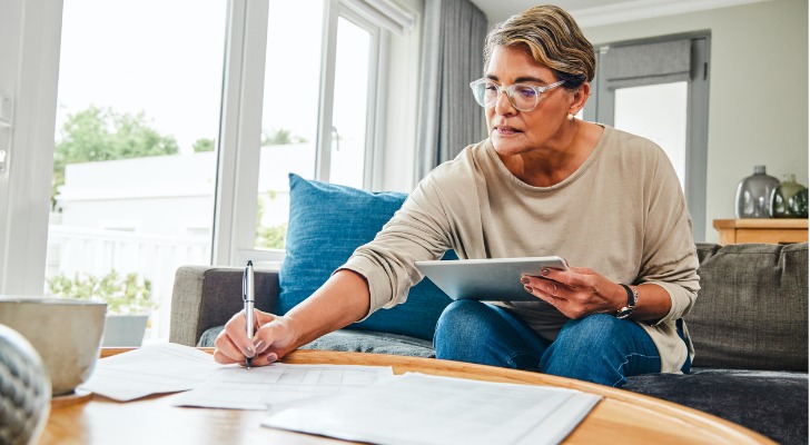 Woman checking how her gross estate is growing