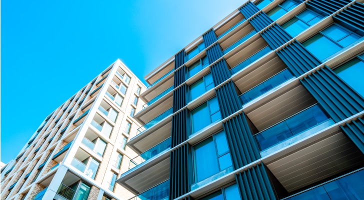 Buying an apartment building is one way to invest in multifamily real estate.