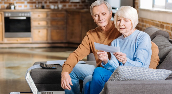 Senior couple looking at their Social Security check