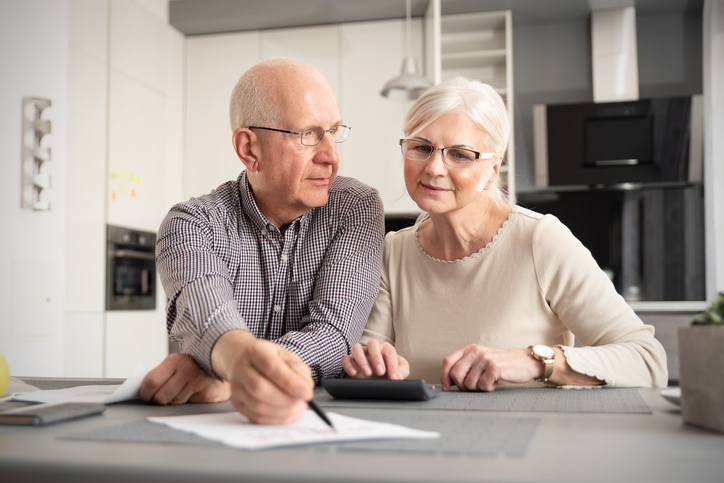 Husband and wife consider rolling over their 401(k) to a Roth IRA.
