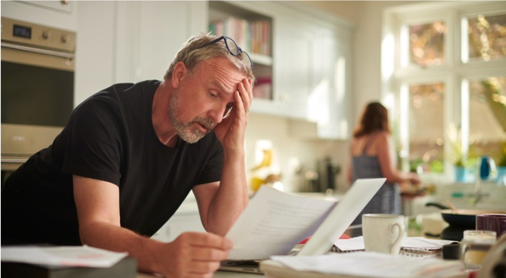 A man stresses over the early surrender charges of his deferred annuity. 