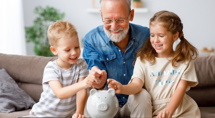 A grandfather teaching his grandkids about saving money and investing in I bonds.