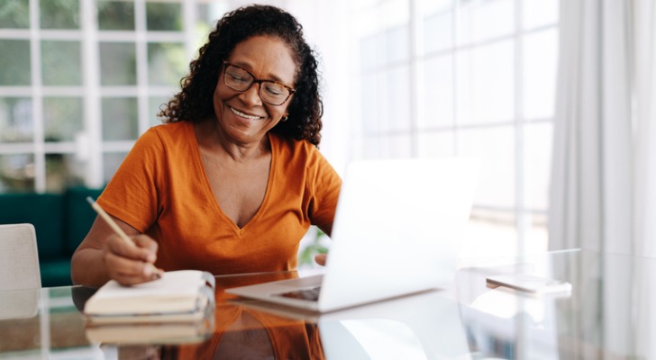 A 65-year-old woman goes over her finances to determine whether she can afford to retire.