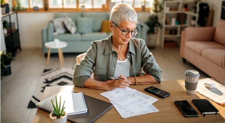 A 60-year-old woman looks over her finances to determine whether she can retire in three years.