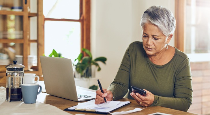 A woman calculates how much income she'll need to generate in retirement.