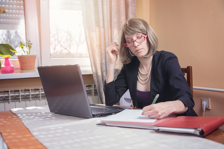 A woman considering the benefits and drawbacks of taking out an annuity.
