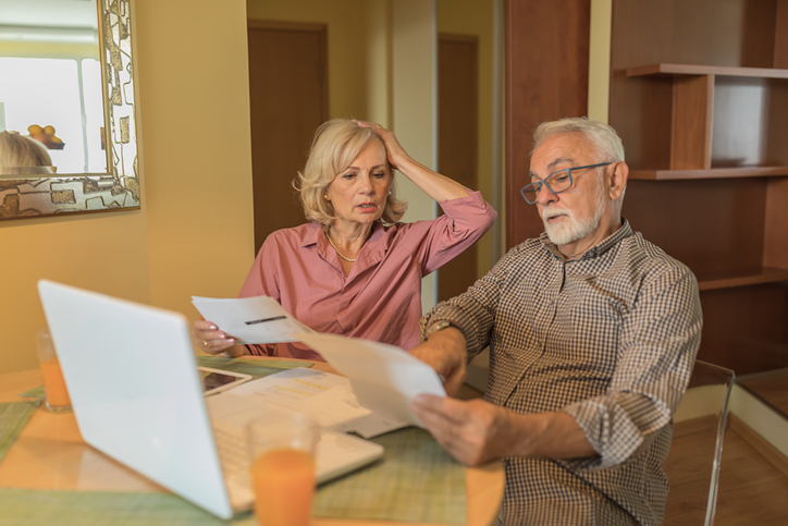 A senior couple researching how to revoke a power of attorney. 