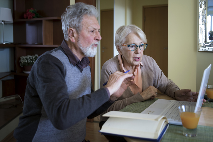 A senior couple researching strategies to avoid probate in Indiana.