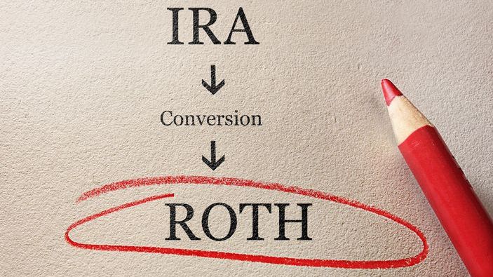 Converting a traditional IRA into a Roth IRA will require you to pay taxes up front on the money that's converted, and in return, it will grow tax-free. 