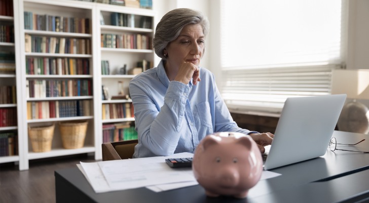 A 65-year-old woman contemplates a Roth conversion while looking over her IRA. 