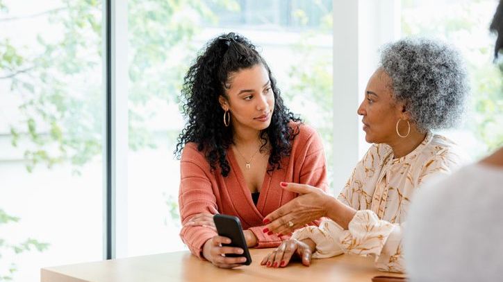 A woman talks with her daughter about her enhanced life estate deed. 