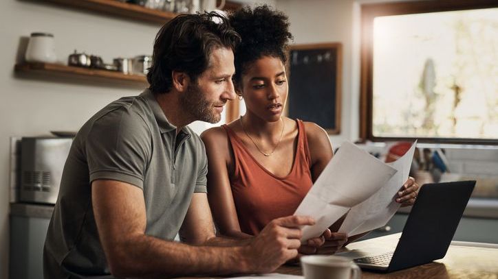A couple goes over their options for paying for a sudden expense, including 401(k) loans.