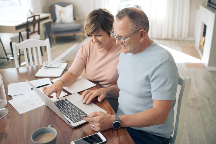 A couple researching ways to save immediately for retirement past age 55.