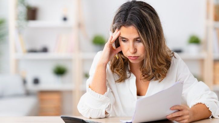 A woman who's thinking about taking an early withdrawal from her IRA stresses about the 10% tax penalty she'll owe.