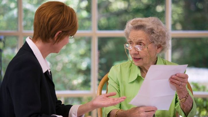 A woman meets with an elder law attorney to discuss her end-of-life care.