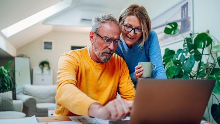 A couple who's approaching retirement calculates their RMDs and how much they'll owe in taxes on their retirement income.