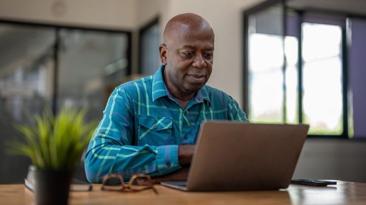 A man calculates how much he'll owe in taxes on his Social Security benefits using the IRS's Interactive Tax Assistant (ITA) tool.