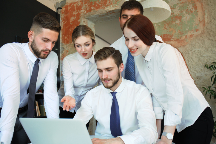 A financial advisor team reviewing a business continuity plan. 