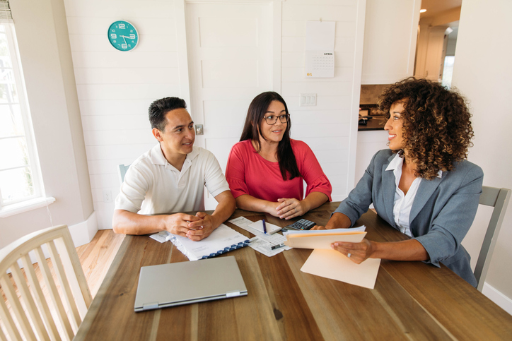 An advisor working with a couple to create an estate plan in Colorado.