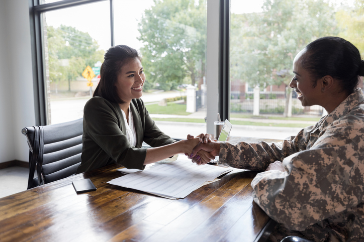 A soldier meeting with a financial planner.