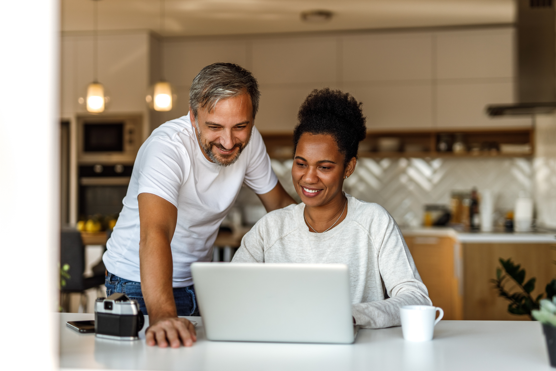 A couple looking up rental property deductions. 