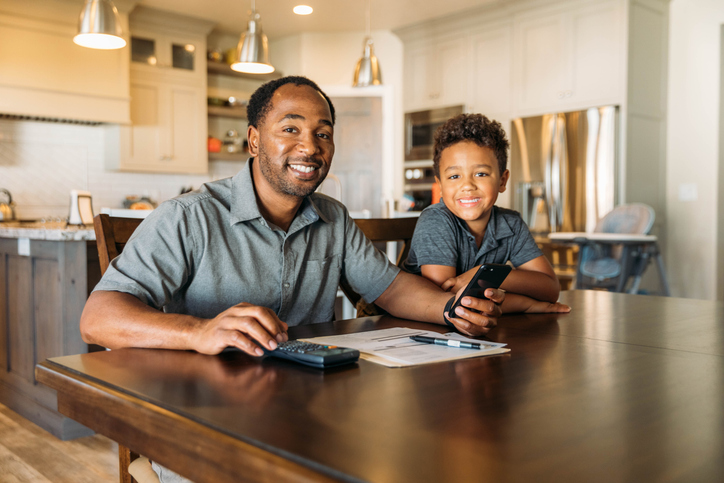 A man researching whether education savings accounts are tax deductible before creating one for his child.