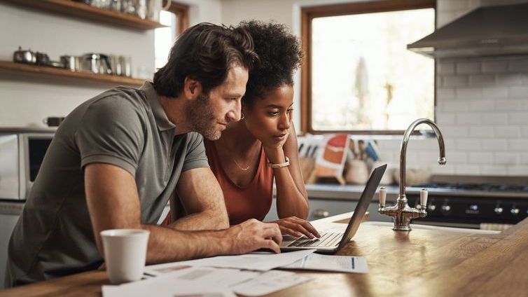 A couple reviews their housing costs to see if they can reduce their overall housing expense ratio.