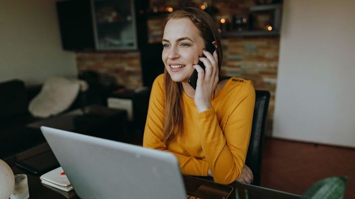 A real estate investor speaks with a real estate agent in another state about a property she's interested in purchasing.