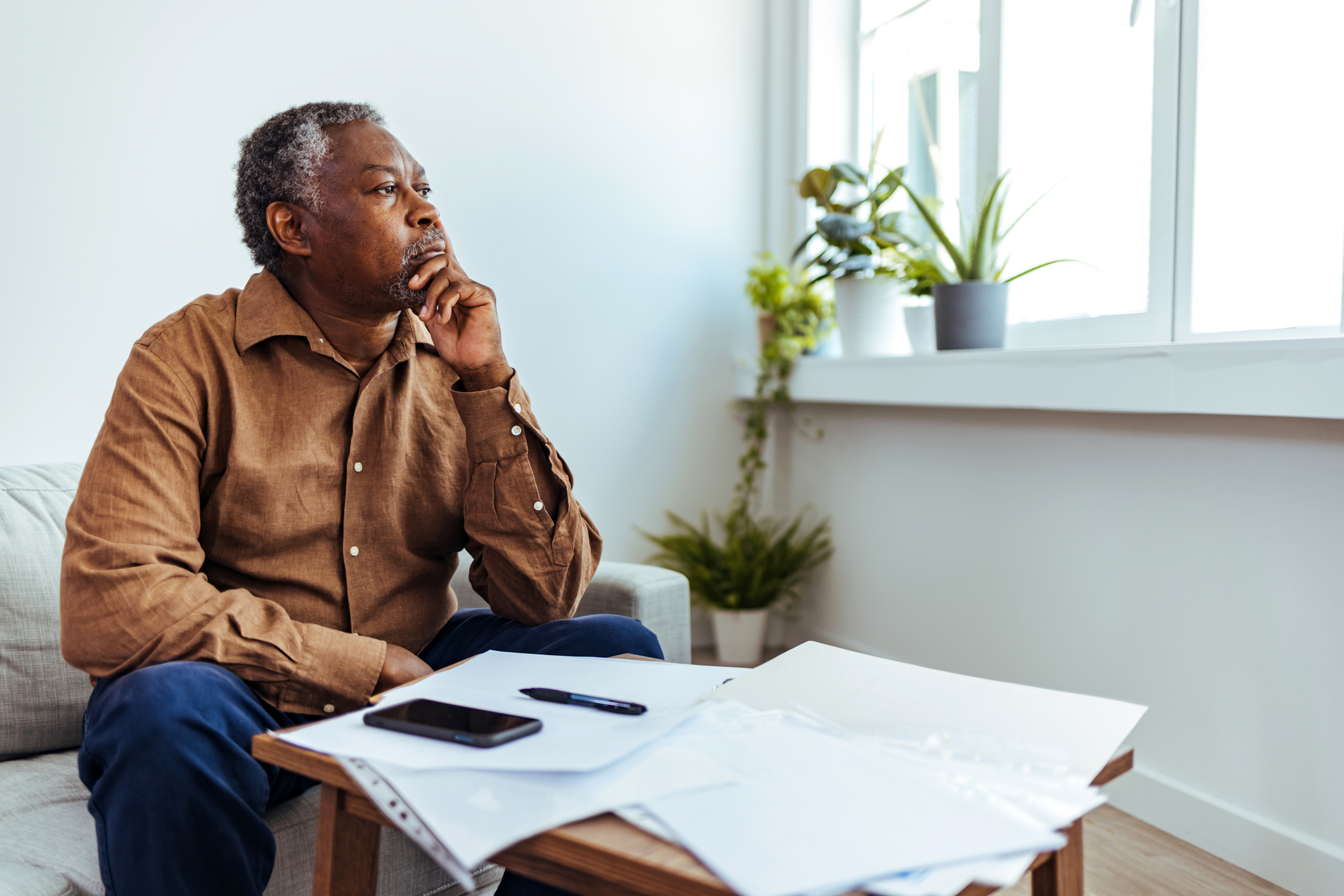 A senior researching how to claim spousal Social Security benefits.