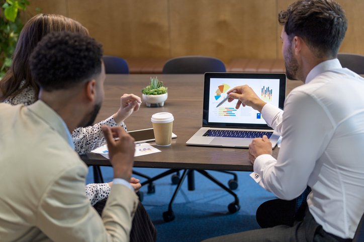 A couple works with their advisor to create a personalized investment portfolio.