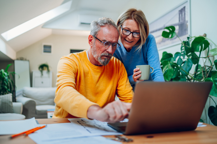 A couple researching Louisiana estate planning laws.