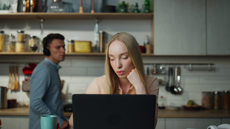 A woman looking up options to consolidate debt.