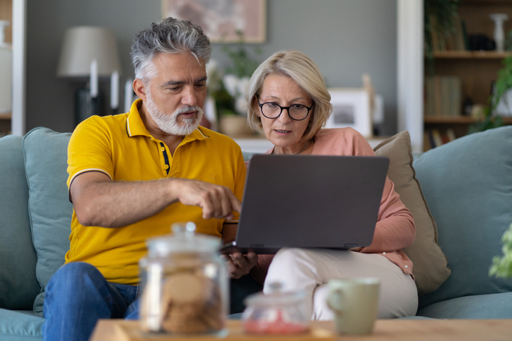 A couple reviews their 529 plan savings. 