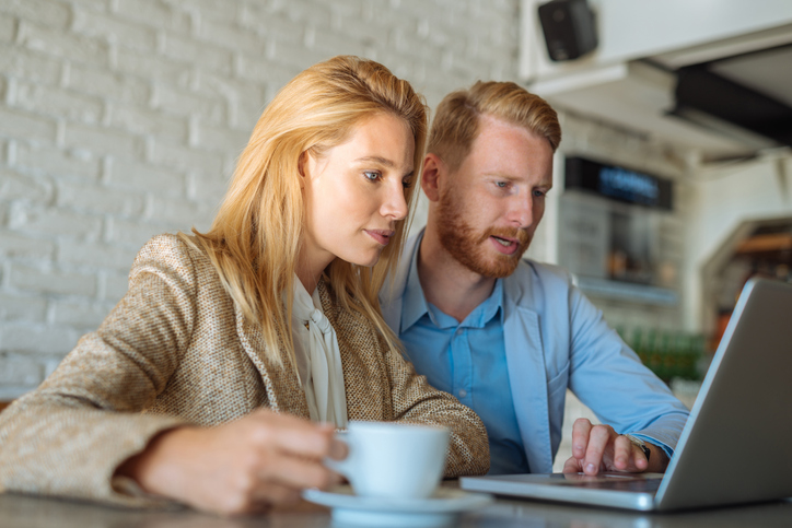 A couple creating a debt consolidation plan.