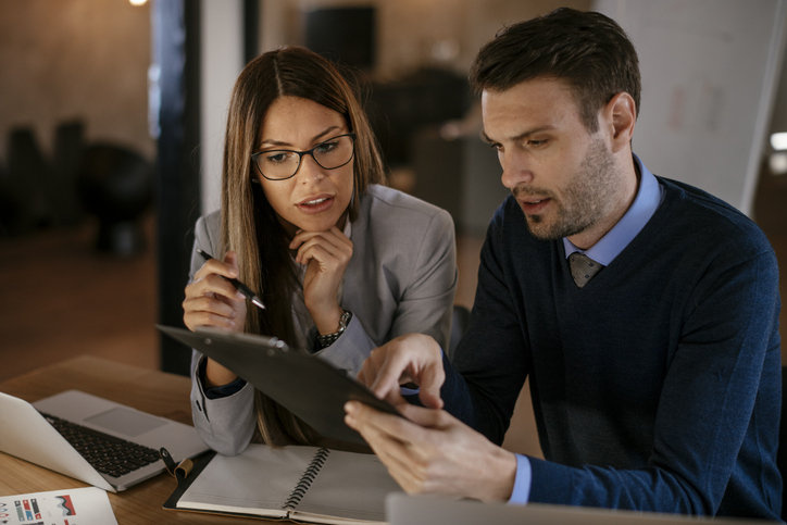 A financial advisor reviewing investments for a client.