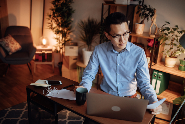 A man reviewing his investment portfolio.