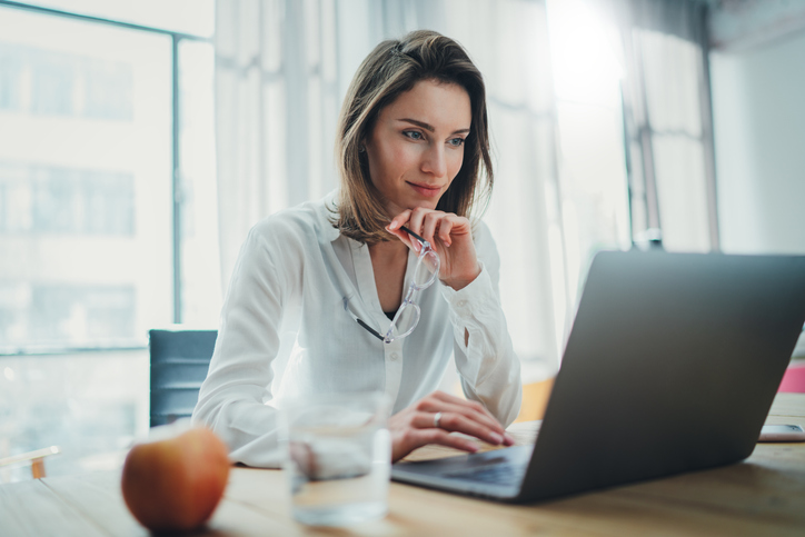 A woman looking for ways to add low-risk investments to her portfolio. 